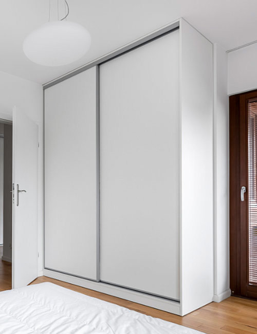 Built-in sliding wardrobe doors with an end panel