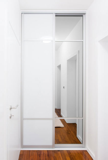 Custom-fit sliding wardrobe doors designed for narrow spaces