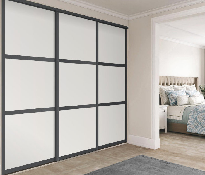 Shaker-style sliding wardrobe doors with Satin Pure White glass panels and Graphite Grey frame and tracks.