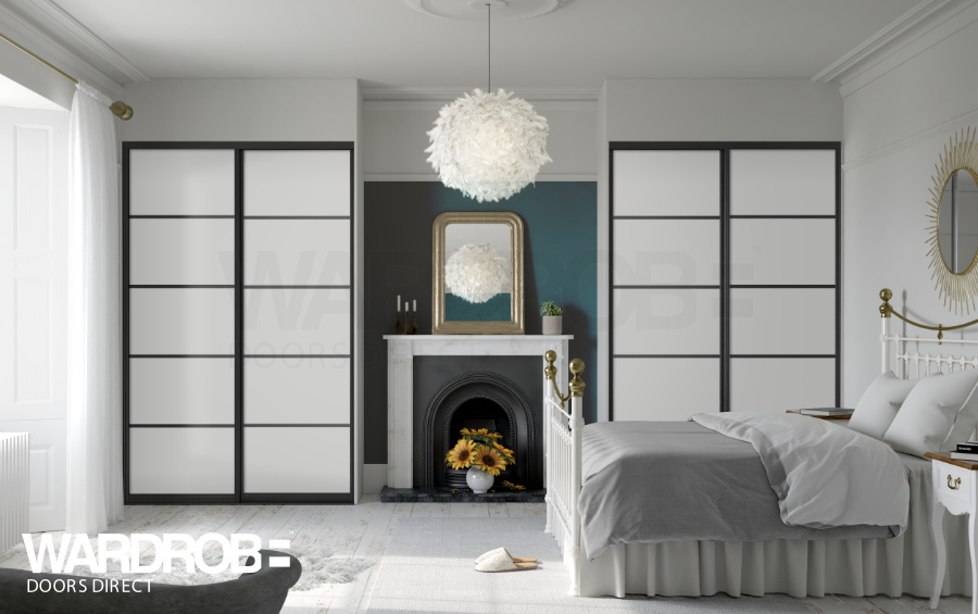 Satin White glass (frosted) sliding wardrobe doors with Black frame and tracks.