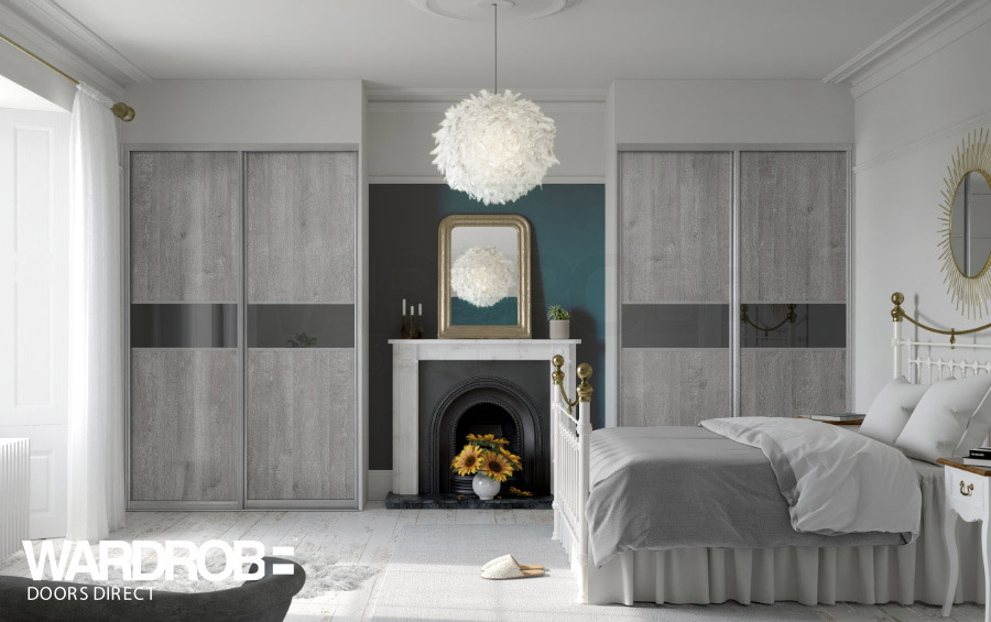 Grey Brown River Oak (wood) and Grey mirror sliding wardrobe doors with Silver frame and tracks.