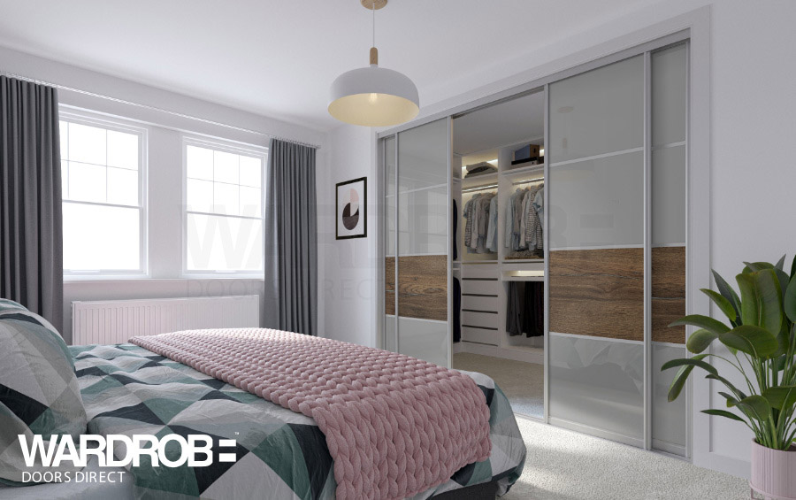Storm Grey (glass) and Pewter Halifax Oak (wood) sliding wardrobe doors with Silver frame and tracks.